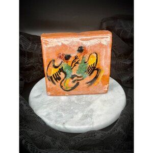 Vintage handmade terracotta tile